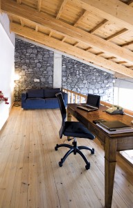 creative-attic-office-room-in-hardwood-floor-decorated-with-black-sofa-and-wooden-table-20160504202145